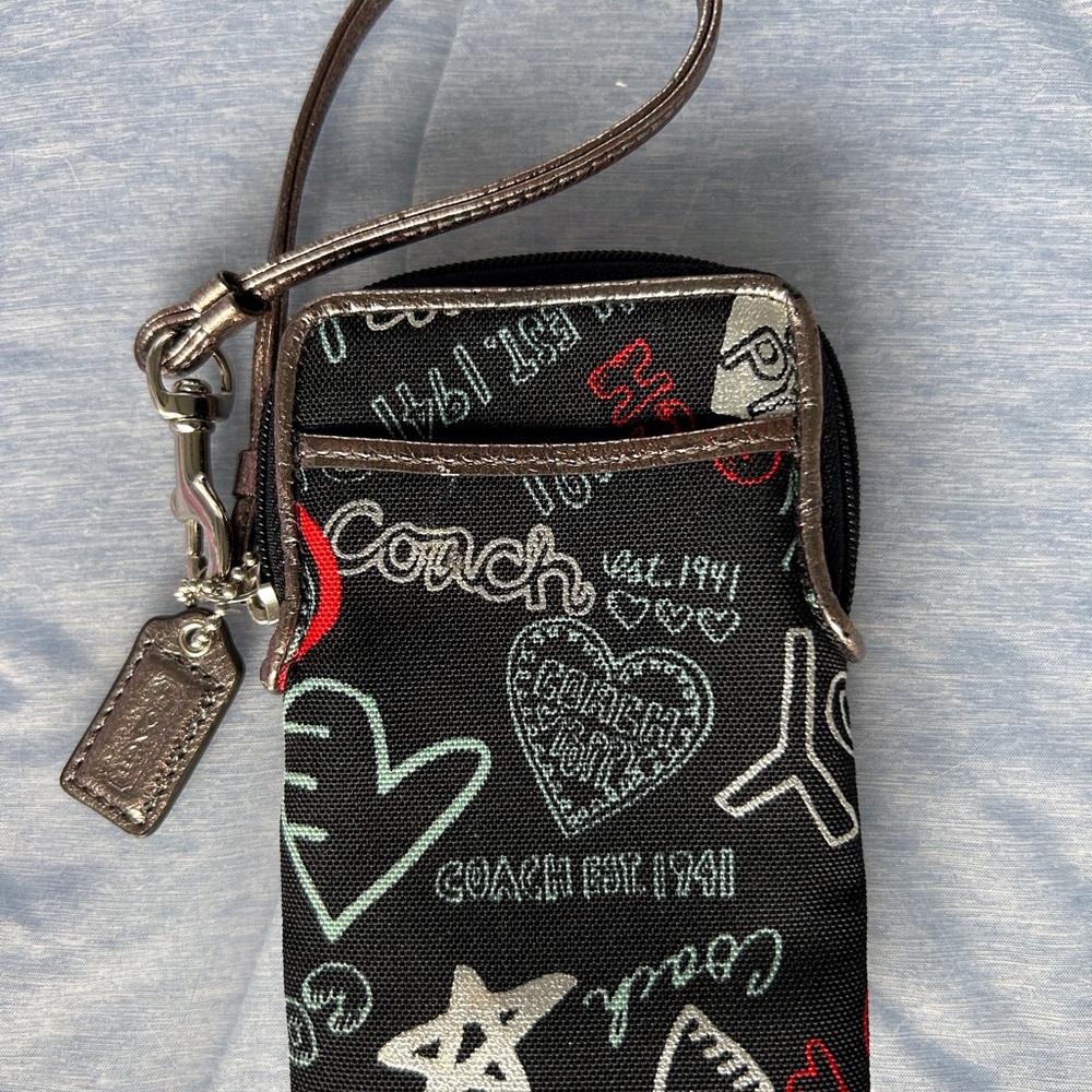Coach Black Wristlet with Poppy Heart and Star Design